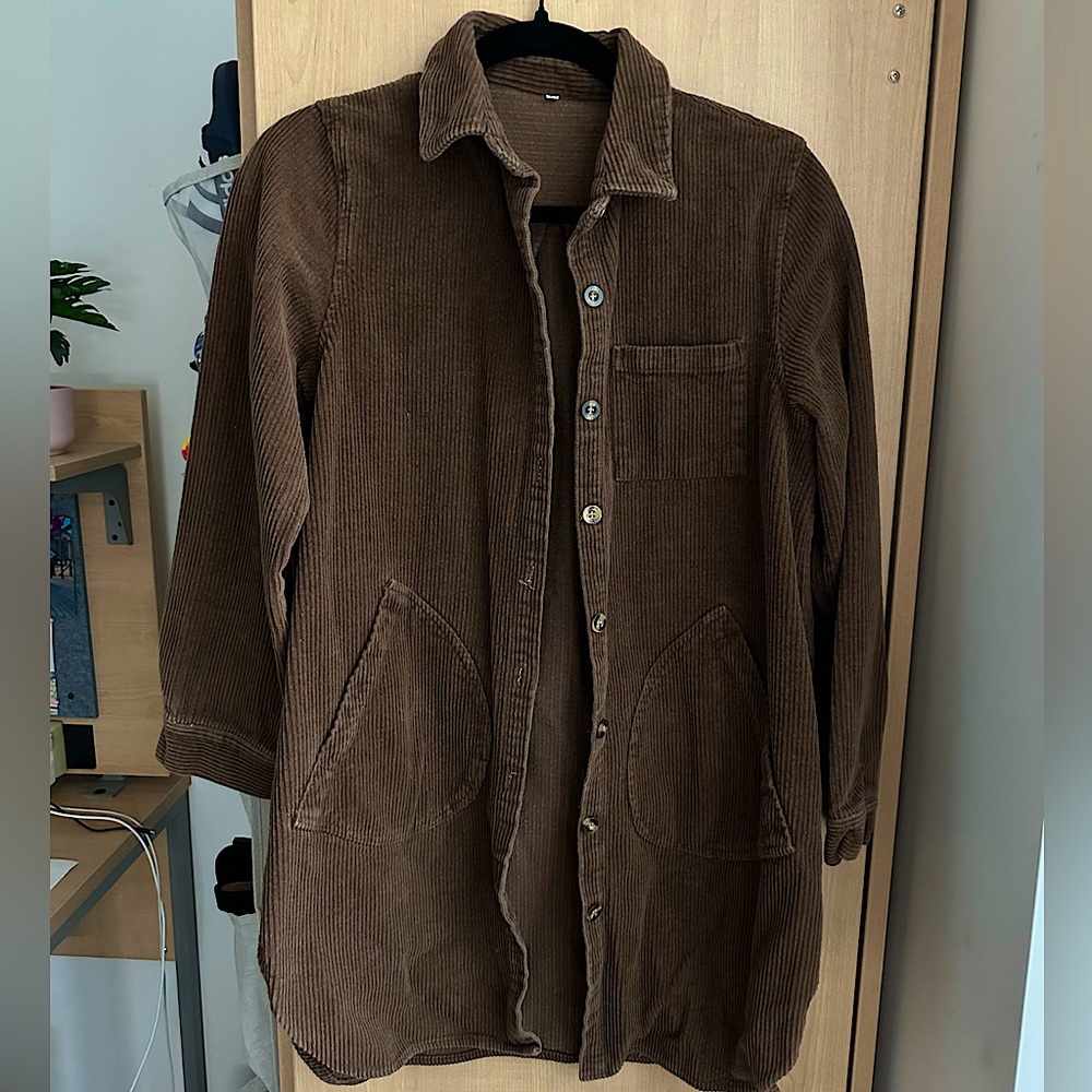Purchased from amazon. Medium Brown Ribbed Jacket. Worn once.